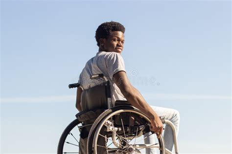 Black Man In Wheelchair Enjoying Sunny Day In Park Stock Photo Image