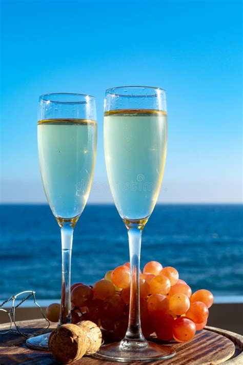 Champagne, Prosecco or Cava Served with Pink Grape in Two Glasses on ...