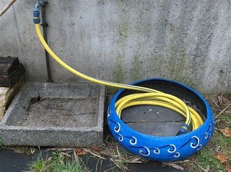 Нехитрые приспособления для хранения шлангов. А как у вас ...