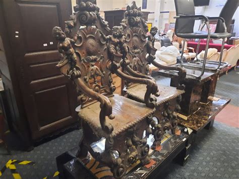 Pair Of Cherub Motif Chairs Southgate Auction Rooms