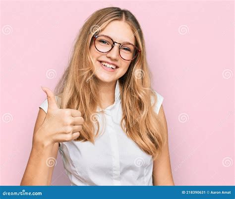 Beautiful Young Caucasian Girl Wearing Casual Clothes And Glasses Doing