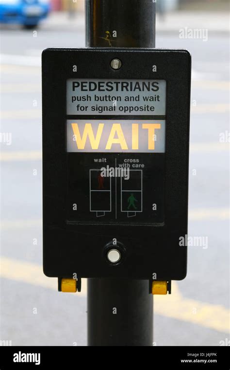 Pedestrians Push Button Push Button And Wait For Signal Opposite Hi Res