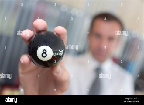 Player Holding A Billard 8 Ball Stock Photo Alamy