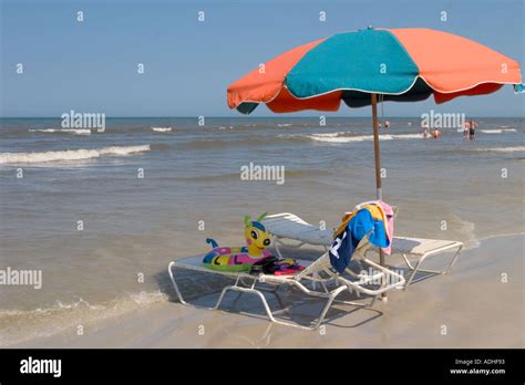 Chairs And Umbella On The Beach On The Atlantic Ocean Daytona Beach