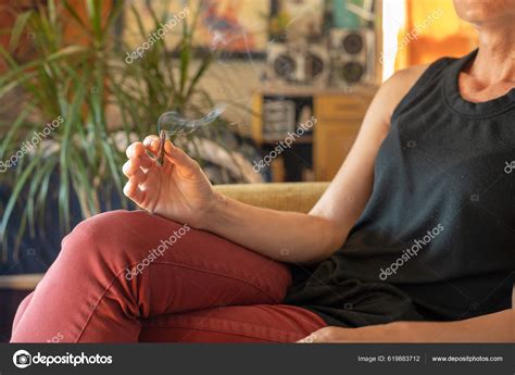 Person Seen Smoking Cannabis Joint Indoors — Stock Photo © rushay ...