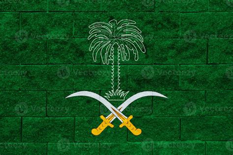 Flag and coat of arms of Kingdom of Saudi Arabia on a textured ...