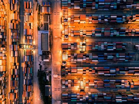 Premium Photo Aerial View Of Illuminated Commercial Dock At Night