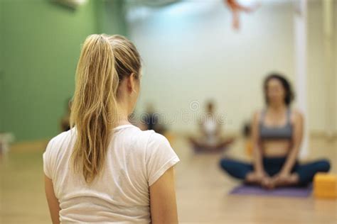 Back View Of Blonde Yoga Teacher While Teaching Classes Stock Photo Image Of Mind Meeting