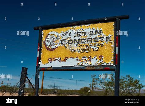 Weathered Colorful Company Sign Against A Deep Blue Sky Wickenburg