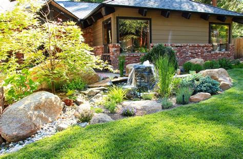 Beautifully landscaped front yard. . . . Landscaping designed in ...