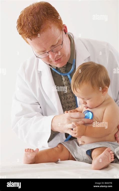 A Pediatrician Examining A Baby Stock Photo Alamy