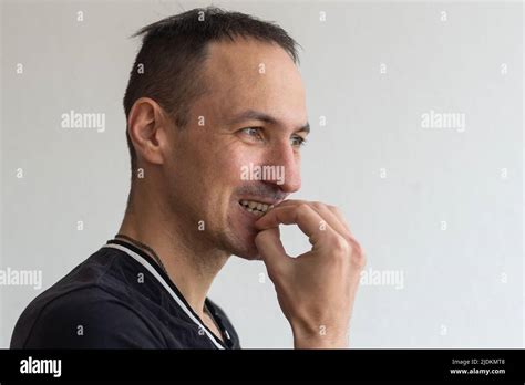 Scared Man Biting Nails Hi Res Stock Photography And Images Alamy