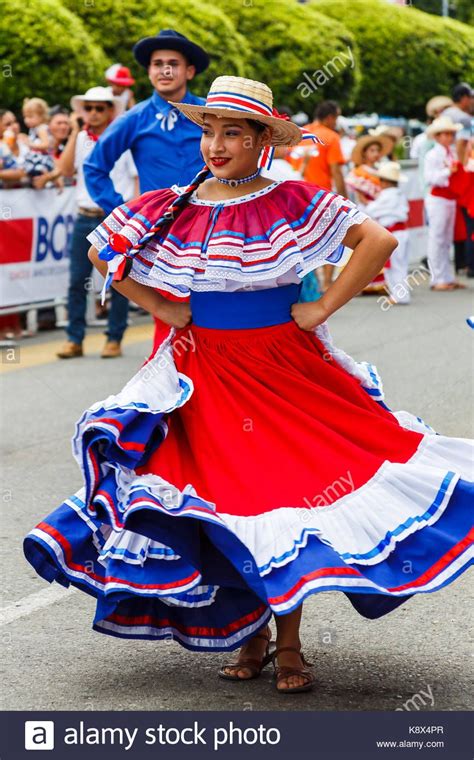 Dancers in colorful traditional costumes wow onlookers with their ...