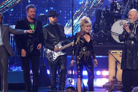 Dolly Parton Rock Hall Induction Brings In Simon Le Bon Rob Halford