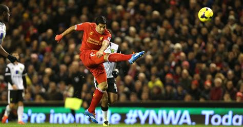 Liverpool's Luis Suárez scores during the match against Norwich at ...