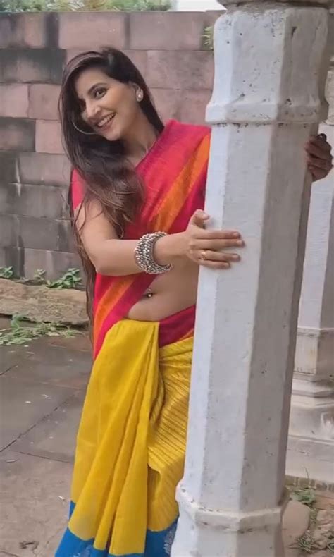 Jolly Bhatia Sexy Navel Show In Red And Yellow Saree