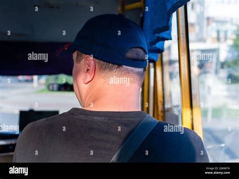 Passenger in public transport. Close-up of a middle-aged man in ...