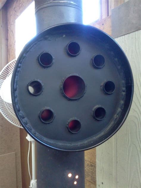 A Large Metal Object With Holes In Its Center And Some Wires Attached