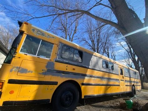 Traveling in their Vintage Bus Conversion