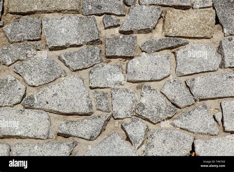 Abstract stone tile texture brick wall background Stock Photo - Alamy