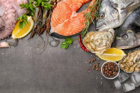 Flat Lay Composition With Fresh Raw Dorado Fish And Different Seafood