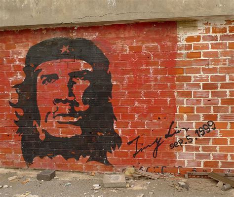 Che Guevara graffiti on red brick – Gem's Photos and Videos