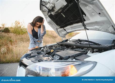 Beautiful Woman Near A Broken Car Confused Woman Does Not Know What To