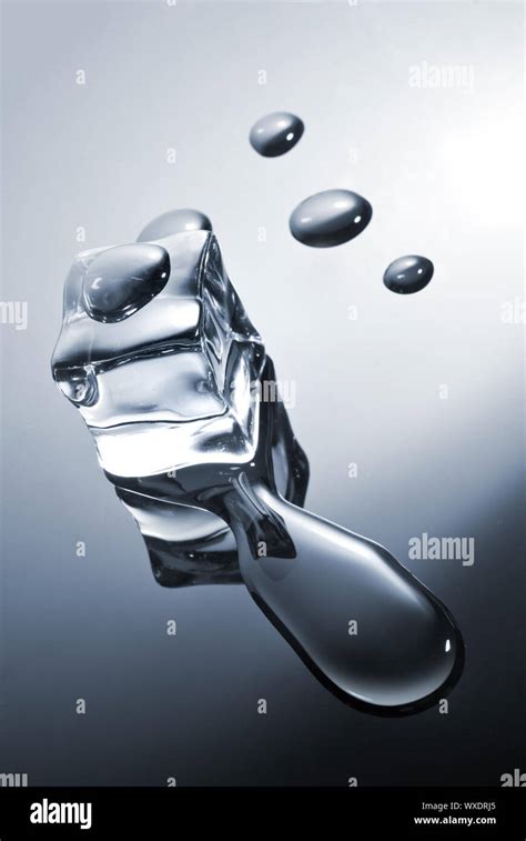 Ice Cube With Water Drops Stock Photo Alamy