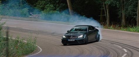 The Stig Is At It Again This Time Drifting The Mercedes Amg C63 Black Series Autoevolution