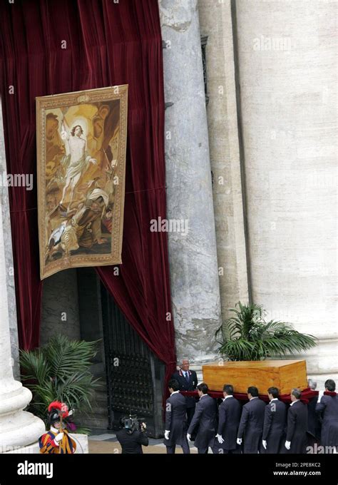 The Coffin Containing The Body Of Pope John Paul Ii Is Carried Into St