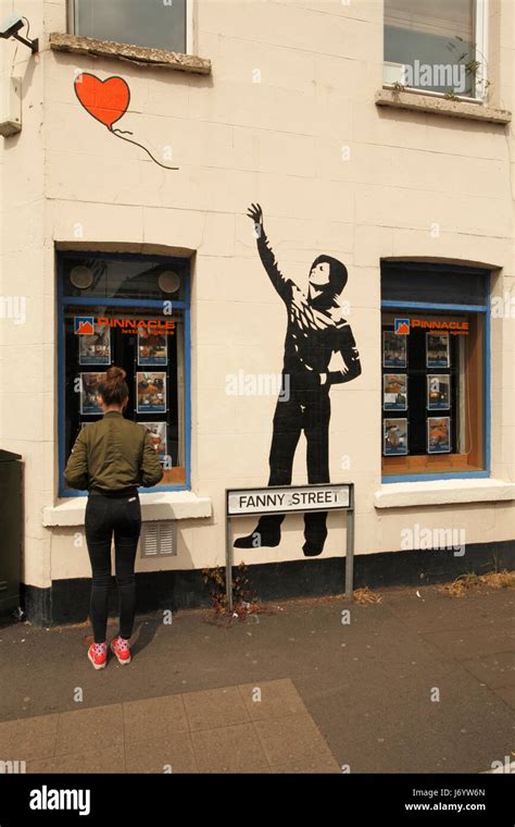 Banksy Style Wall Mural In Fanny Street Cardiff With A Heart Shaped