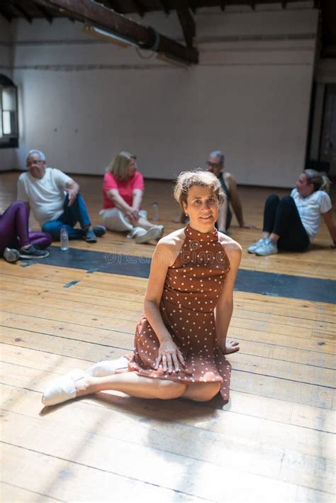 Smiling Elegant Mature Woman Resting After Dance Class Stock Image