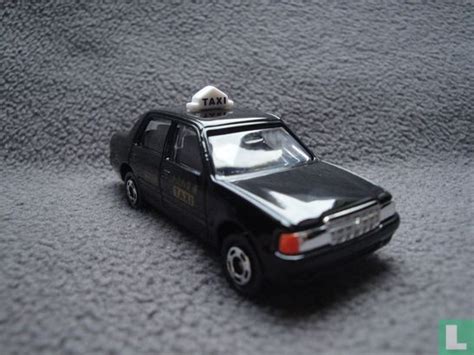 Toyota Crown Comfort Taxi 51 (2022) - Tomica - LastDodo