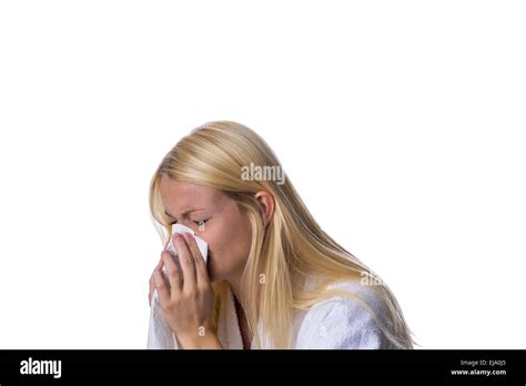 Blonde Sneezes Into A Handkerchief Stock Photo Alamy