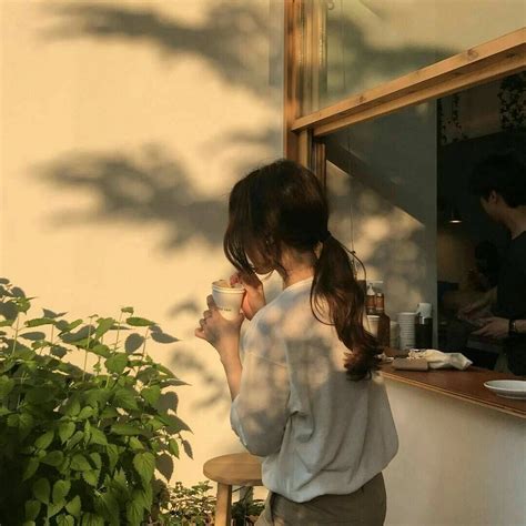Download Girl Aesthetic Drinking Coffee Wallpaper | Wallpapers.com