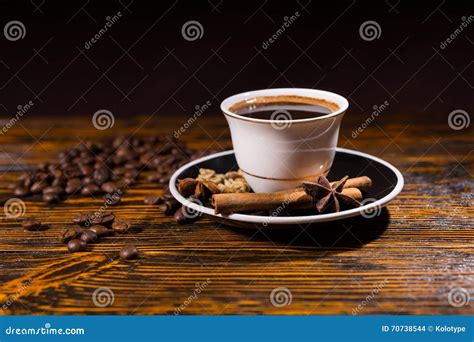 Cup Of Coffee With Roasted Beans And Spices Stock Photo Image Of