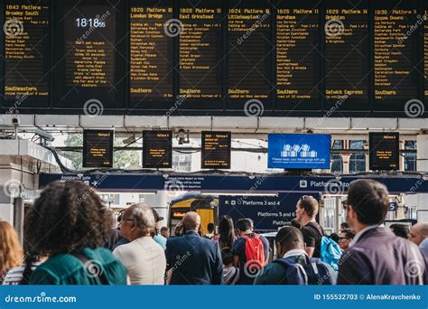 People Waiting For The Platform Announcement Inside Victoria Train