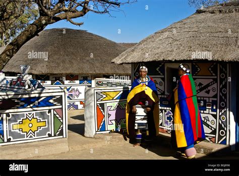 Ndebele women and traditional houses, Botshabelo, South Africa Stock ...