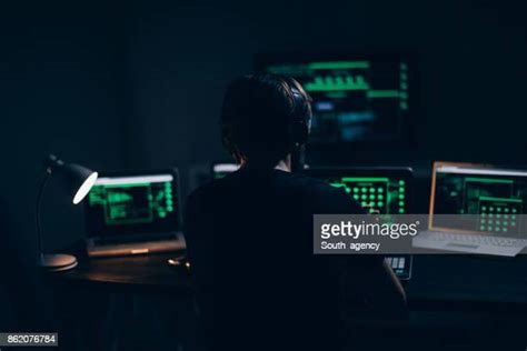 Hacker Behind Screen Photos And Premium High Res Pictures Getty Images