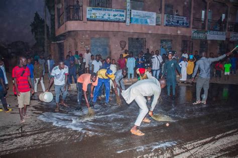 Kaduna Youths Wash Off Tinubus Footprints Burn Brooms After Apc