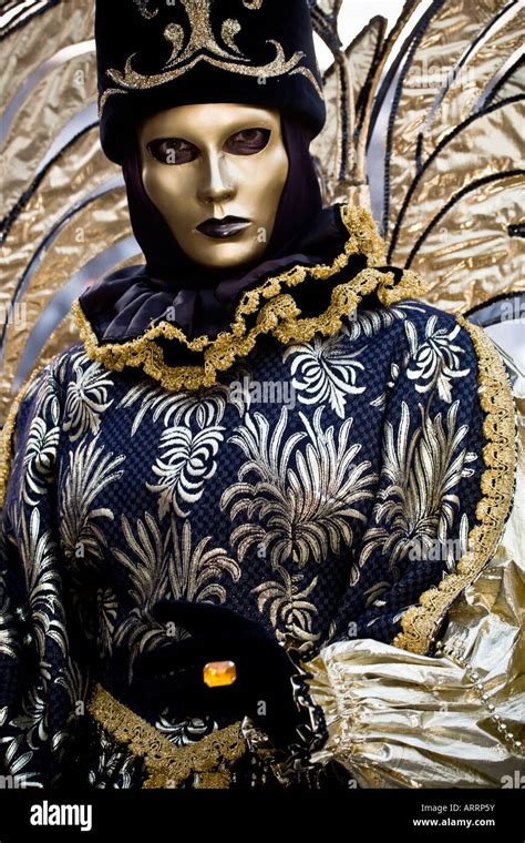 Portrait Of A Person Dressed In Carnival Costume And Gold Mask Venice