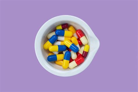 Premium Photo Medicine Concept With Colored Capsules