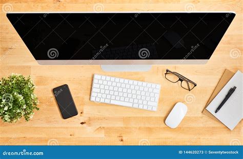 Top View Of Large Desktop Computer On Wooden Office Desk Editorial