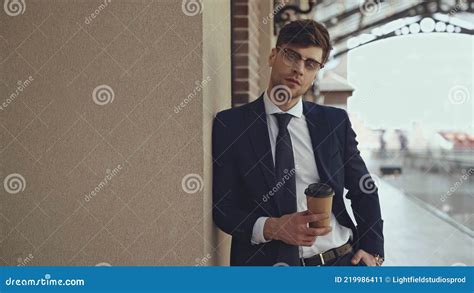 Businessman In Glasses And Suit Holding Stock Image Image Of Building