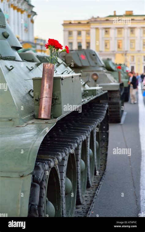 A Red Carnation In The Pocket On A Heavy Soviet Tank KV 1 At The Stock