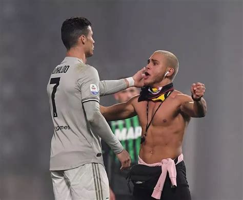 Cristiano Ronaldo Hugs Topless Pitch Invader As He Scores Header In