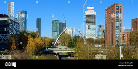 Tower Blocks Of Manchester City Centre Skyline Over The Hulme Arch