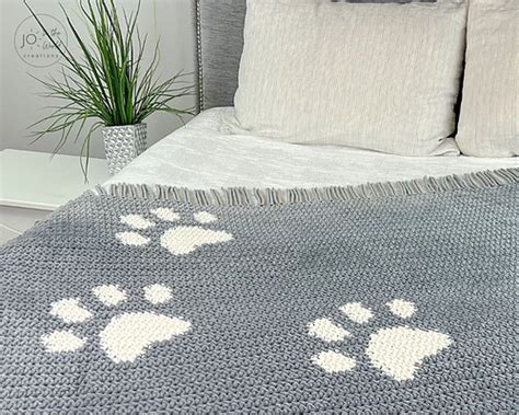 Ravelry Paw Print Blanket Pattern By Jo Edwards