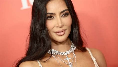 Kim Kardashian Stuns In Blue Bikini In New Photoshoot