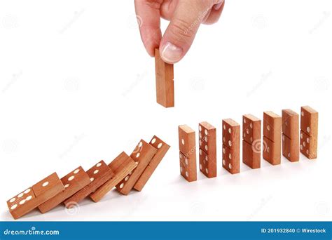 Falling Domino Isolated On A White Background Stock Photo Image Of